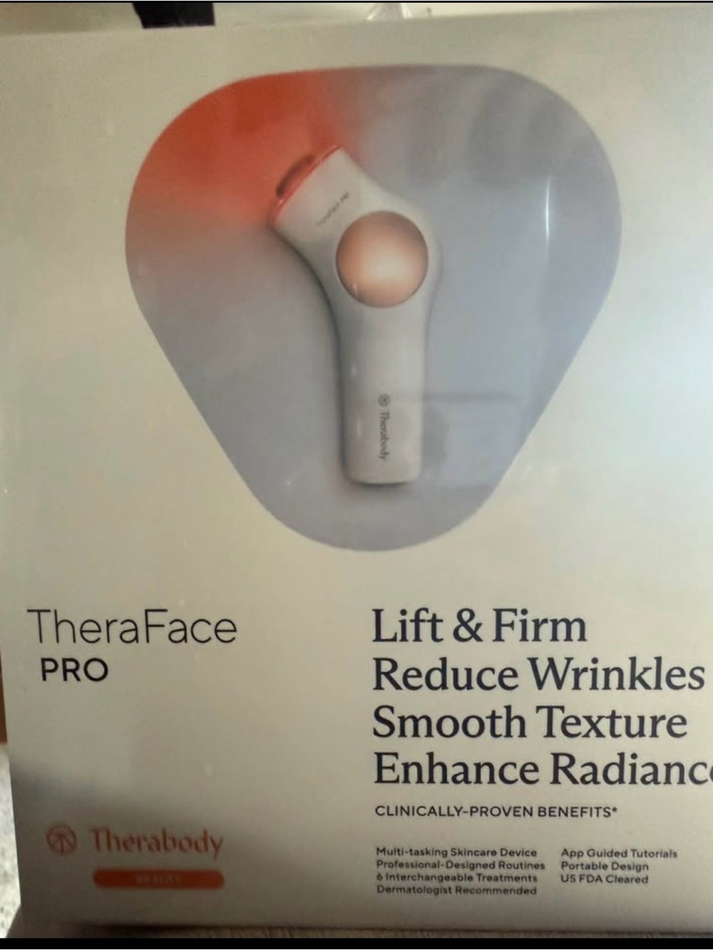 Therabody TheraFace PRO Facial Device in White with Rose Gold Accent